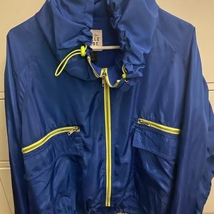 Royal blue with a touch of lime green windbreaker size large